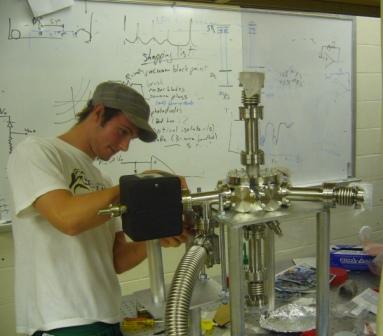 Brandon assembles the vacuum chamber.